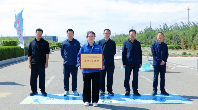 新能源公司組織職工參加武威涼州工業(yè)園區(qū)“匠心向黨 步履不?！甭毠そ〔阶呋顒?dòng)